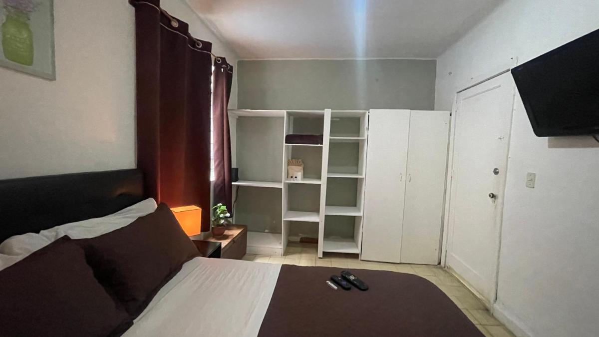 Bonita y amplia habitación cerca del WTC