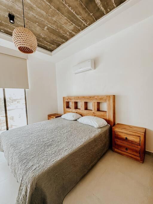 Casa Calec: Dpto B. con piscina/2 min. playa