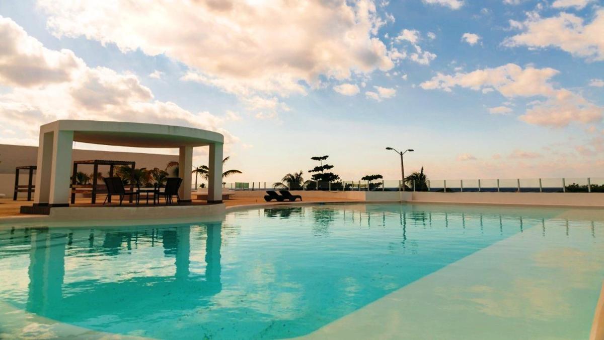Confortable casa en Cozumel, Condominio con alberca y vista al mar # 10