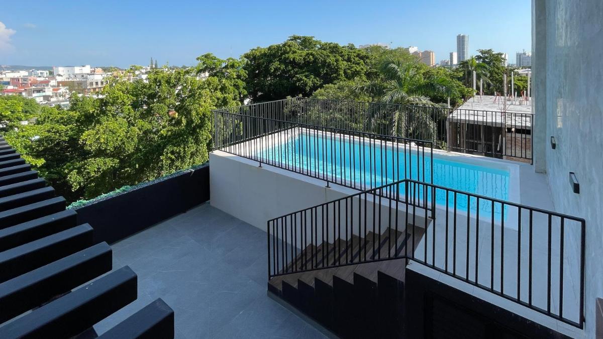 Departamento con Alberca a solo 5 minutos del Malecón - A1