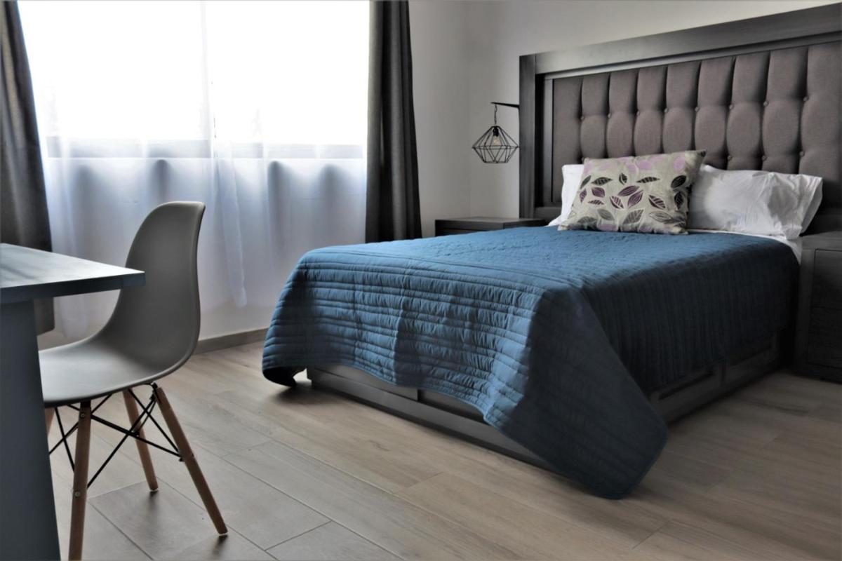 Expo Satelite Hotel & Suites