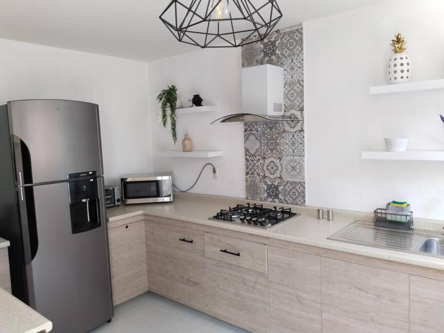 Increible Casa Céntrica con Alberca Climatizada