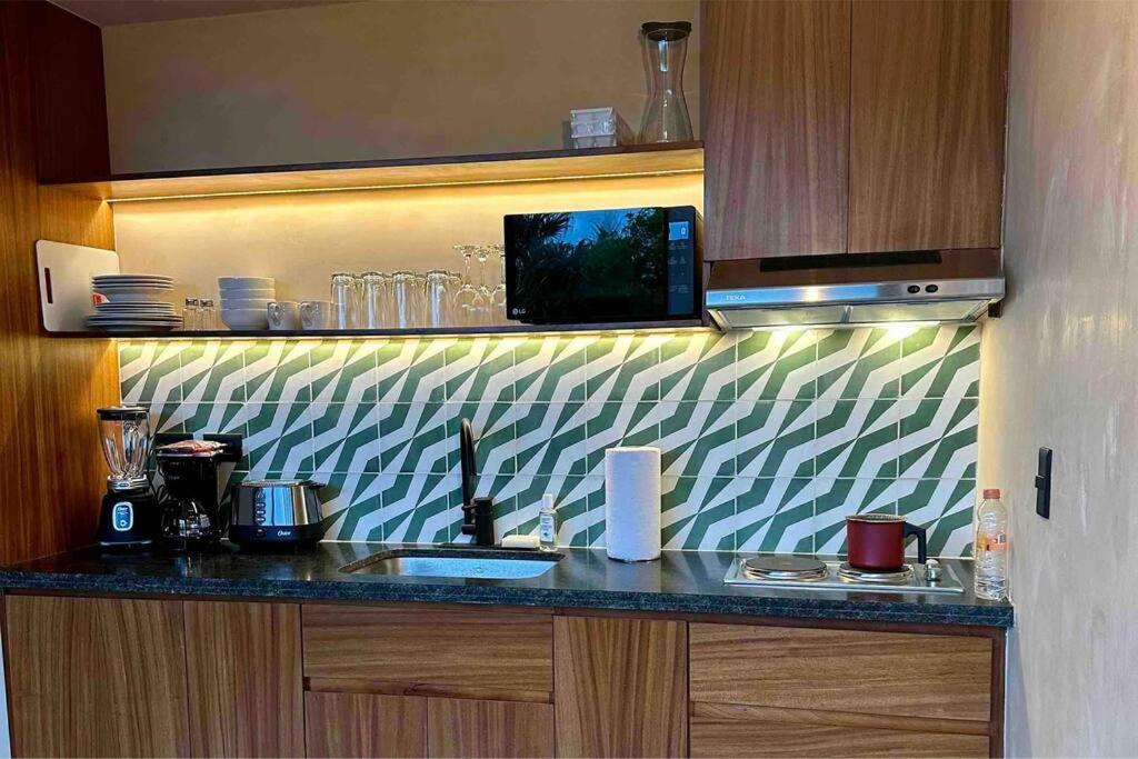 Jungle retreat with 2 pools & private beach access