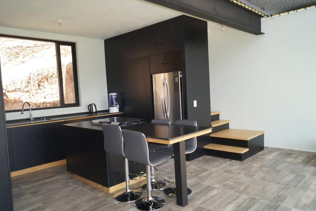 Loft hermoso entre el bosque, vista al Lago.