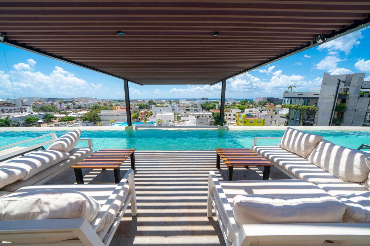 Luxury 2BR condo - Rooftop with Ocean Views At Arenis Condos, Arena