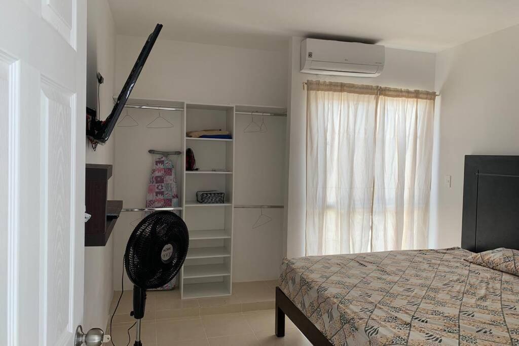 Residencial con seguridad y áreas recreativas.